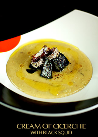 Cream of cicerchie with black squids