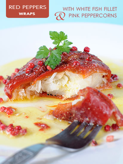 Red Pepper wraps with white fish fillet and pink peppercorns